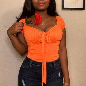 Orange bodysuit